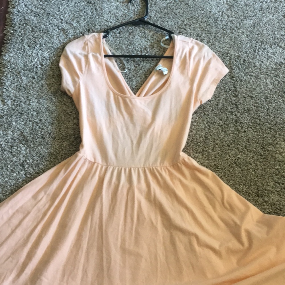 peach colored open back dress